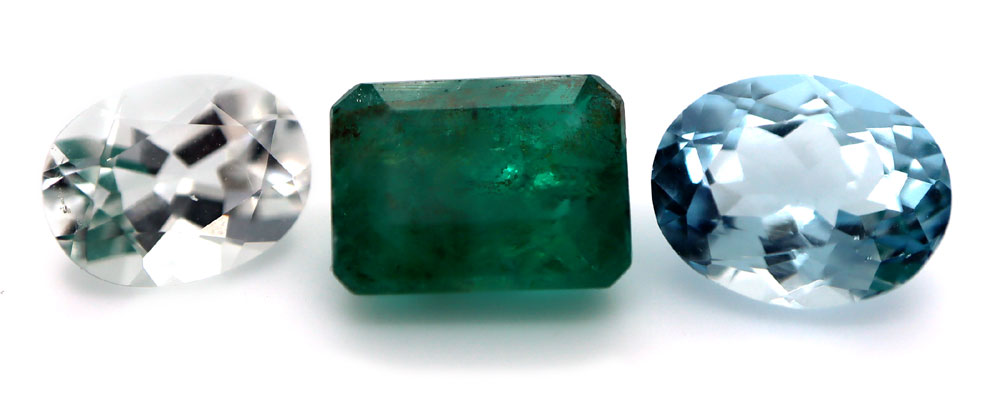 Oval Goshenite, Emerald, Oval Aquamarine, all members of the Beryl Family