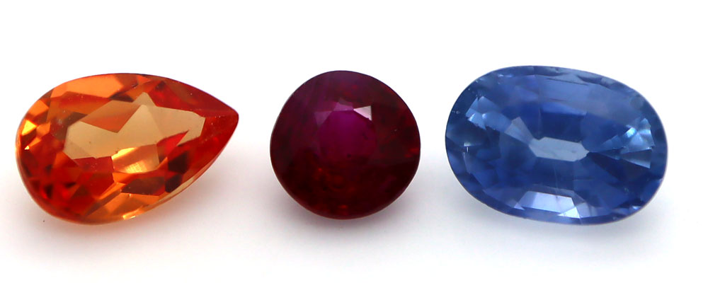 Orange Sapphire, Ruby, Blue Sapphire, all members of the Sapphire family of gemstones